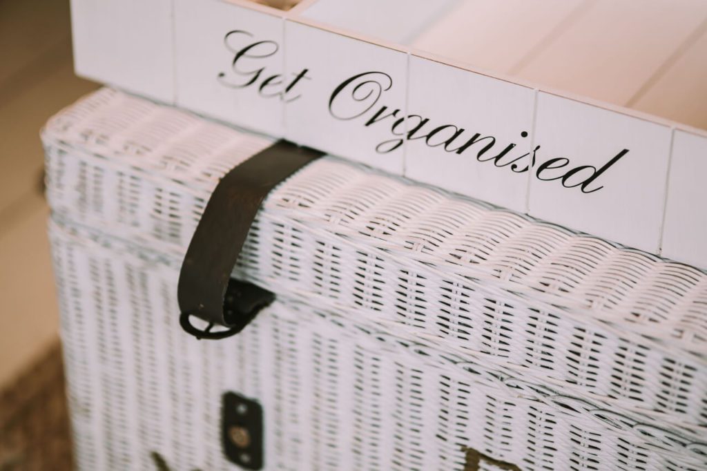 Get organized wording on top of a white basket
