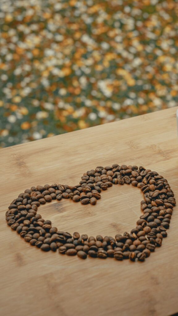 Coffee beans in the shape of a heart.