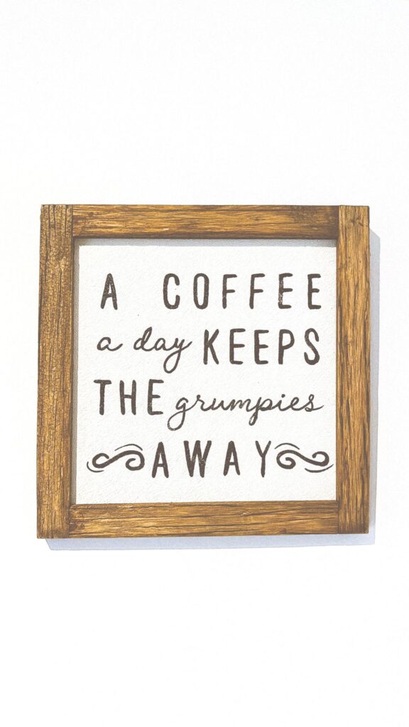 "A coffee a day keeps the grumpies away" quote that would make a perfect coffee phone wallpaper.