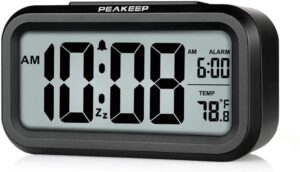 A simple alarm clock like this one makes a great gifts for the impossible man.