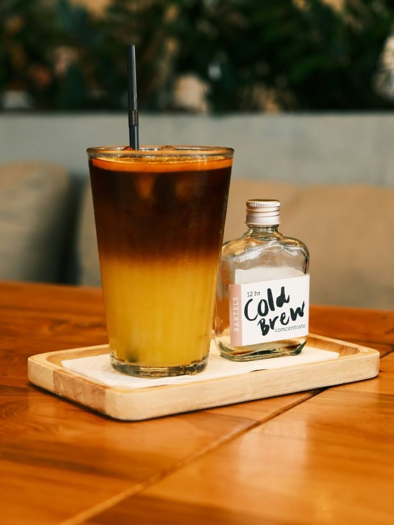 cold brew coffee and orange juice mixed in a glass